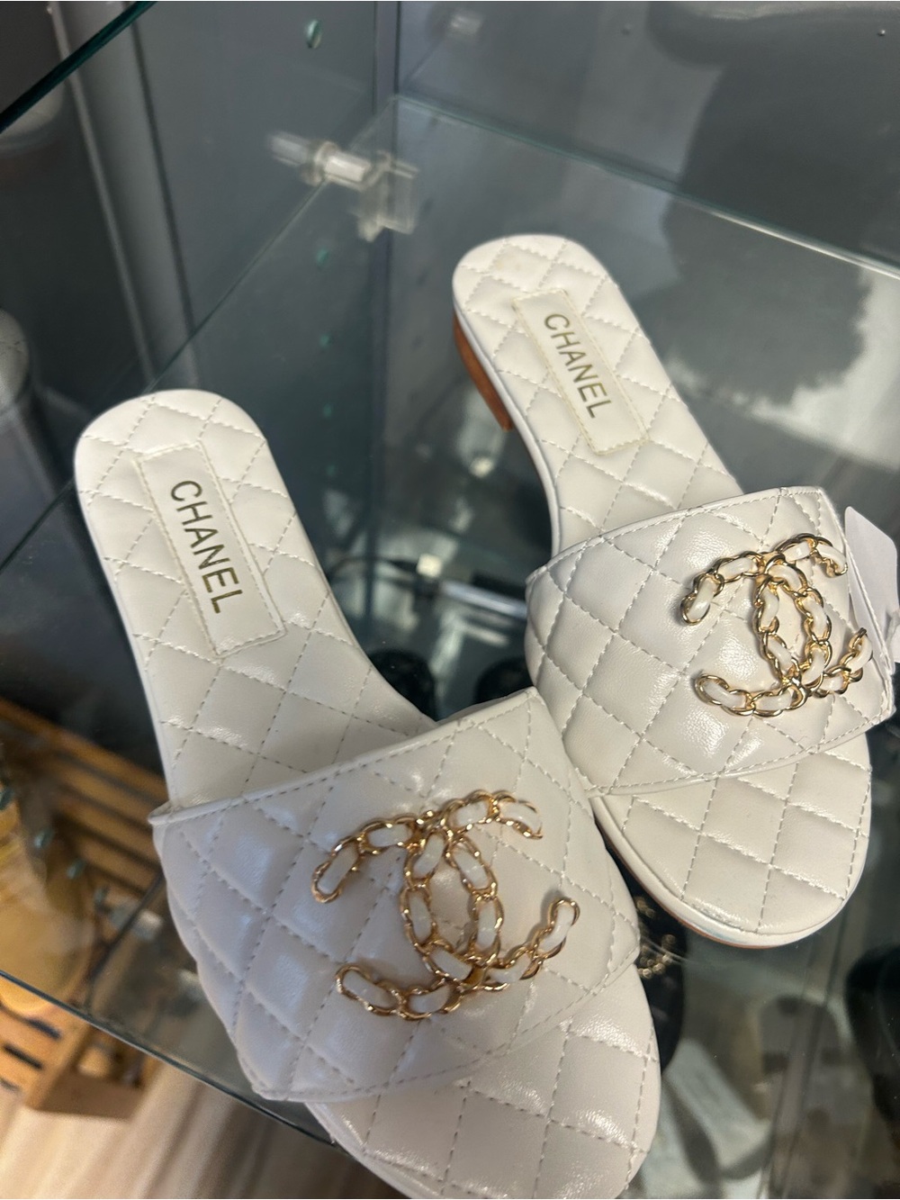 CHANEL White Quilted Leather Slide Mules with Gold CC Chain